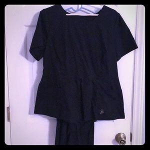 Women’s black Jaanuu scrub set